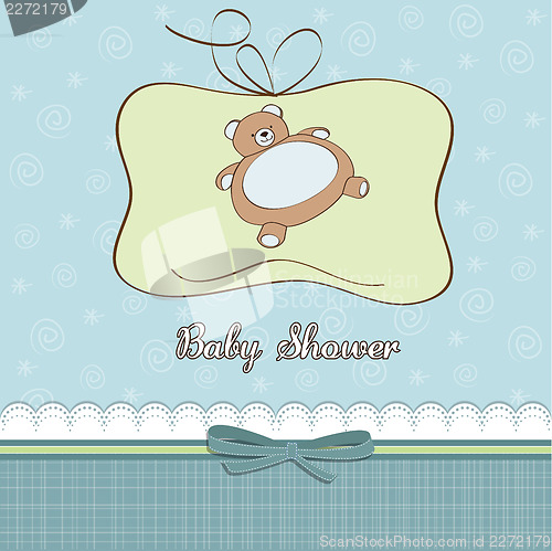 Image of baby shower card with teddy bear toy