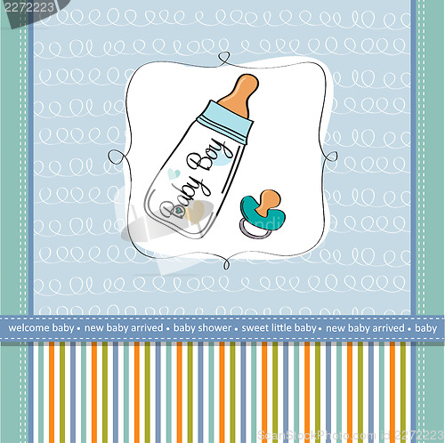 Image of baby announcement card with milk bottle and pacifier