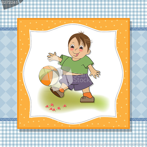 Image of little boy playing ball