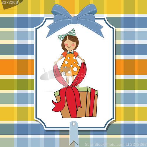 Image of a nice girl with a big gift box
