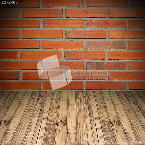 Image of old brick wall and wooden floor