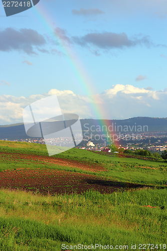 Image of rainbow over the city