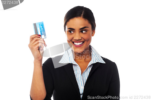 Image of Woman displaying her credit card