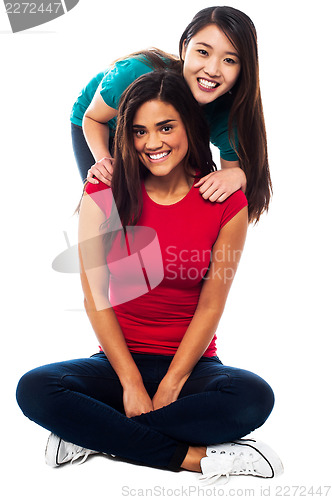 Image of Young smiling girls posing for the camera