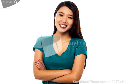 Image of Young smiling chinese model posing casually