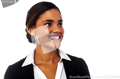 Image of Businesswoman looking away with a smile on face