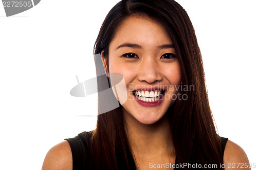 Image of Smiling asian girl with beautiful long hair