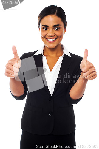 Image of Attractive woman showing double thumbs up