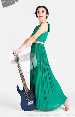 Image of Pretty woman with guitar