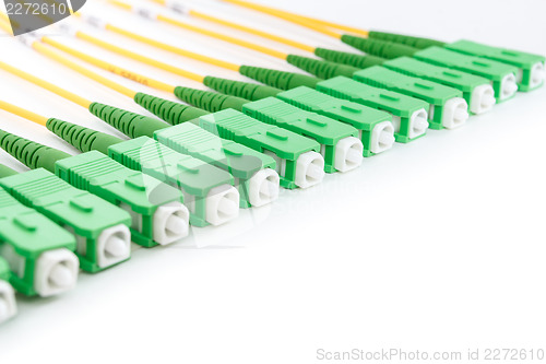 Image of green fiber optic SC connectors