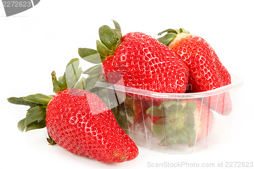 Image of fresh strawberries in box on white