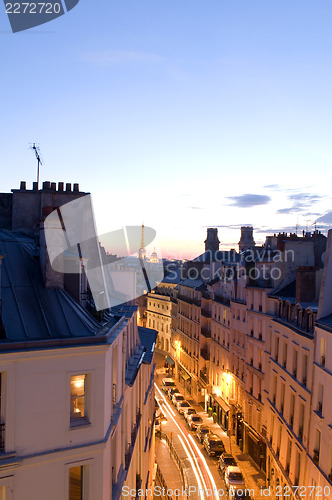 Image of night scene with car movement light streaks Rue de Vaugirard roo