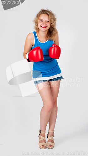 Image of Pretty girl with boxing gloves