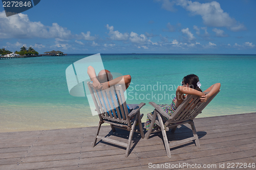Image of happy young couple have fun on summer