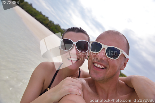 Image of happy young couple have fun on summer