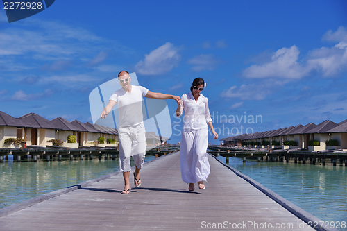 Image of happy young couple have fun on summer