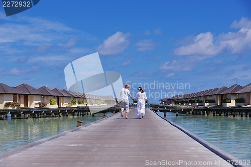 Image of happy young couple have fun on summer