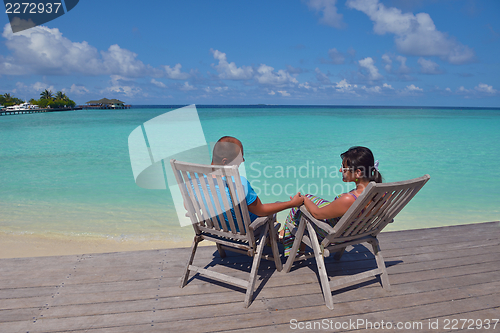 Image of happy young couple have fun on summer