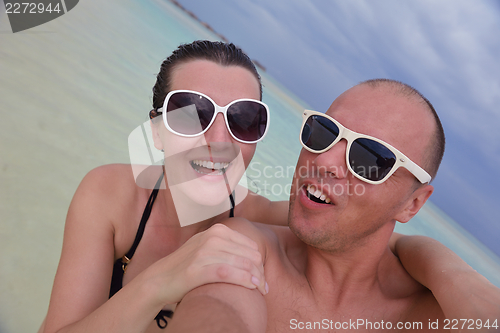 Image of happy young couple have fun on summer