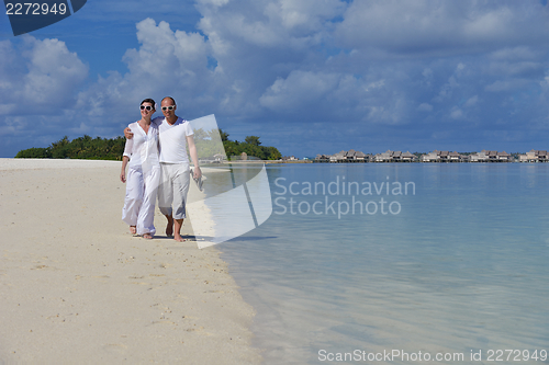 Image of happy young couple have fun on summer
