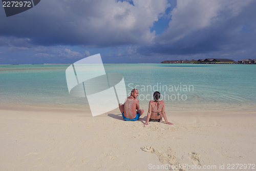 Image of happy young couple have fun on summer