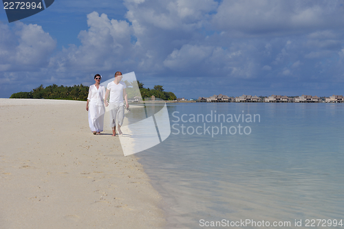 Image of happy young couple have fun on summer