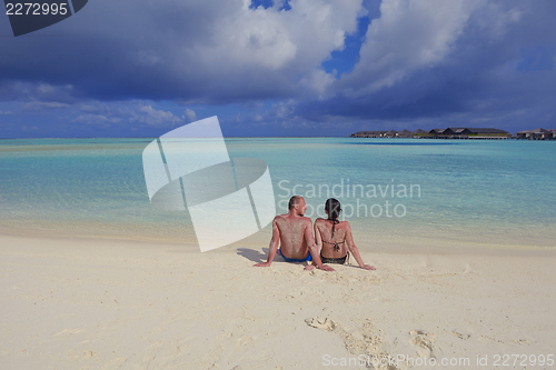 Image of happy young couple have fun on summer