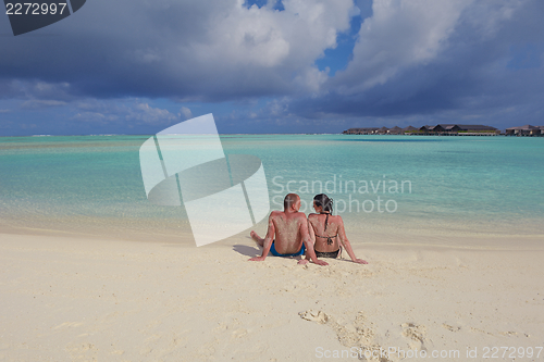 Image of happy young couple have fun on summer