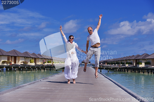 Image of happy young couple have fun on summer