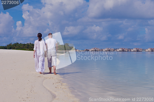 Image of happy young couple have fun on summer