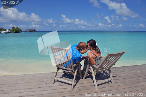 Image of happy young couple have fun on summer