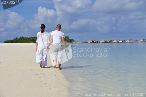 Image of happy young couple have fun on summer