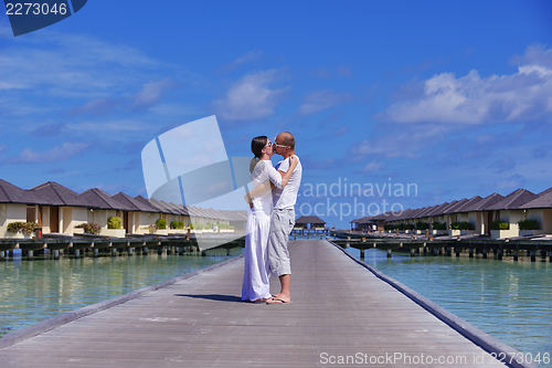 Image of happy young couple have fun on summer