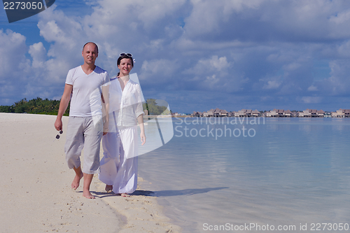 Image of happy young couple have fun on summer