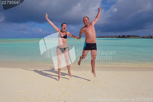 Image of happy young couple have fun on summer