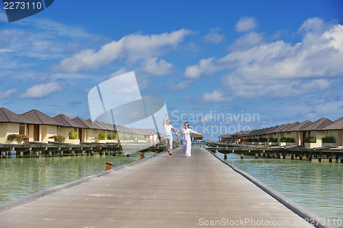 Image of happy young couple have fun on summer