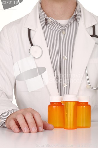 Image of  Doctor With Empty Orange Prescription Bottles