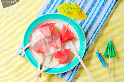 Image of fruit pops of watermelon in heart shaped 