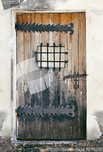 Image of Weathered door of an old building