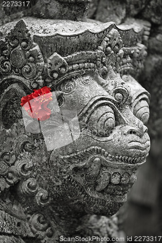 Image of Old stone statue of Balinese god