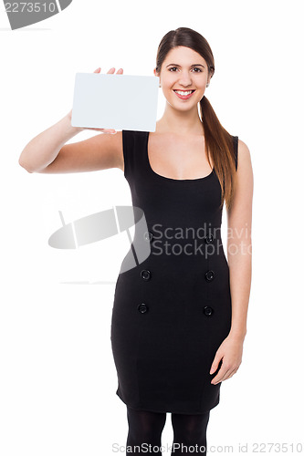 Image of Woman showing blank rectangular billboard