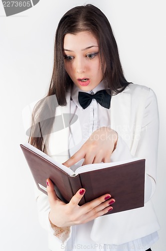 Image of portrait of a business woman with organizer