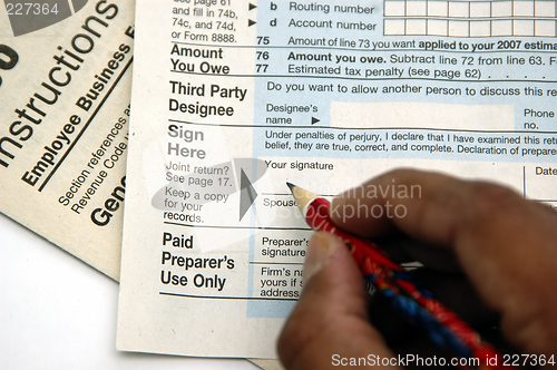 Image of Signing a tax return