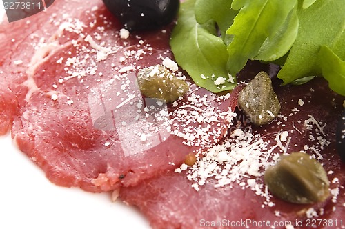 Image of Beef carpaccio with rucola and parmesan 