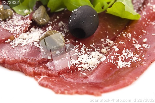 Image of Beef carpaccio with rucola and parmesan 