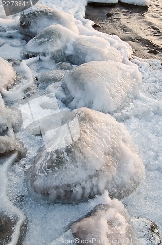 Image of The marine stones covered by an ice, close up