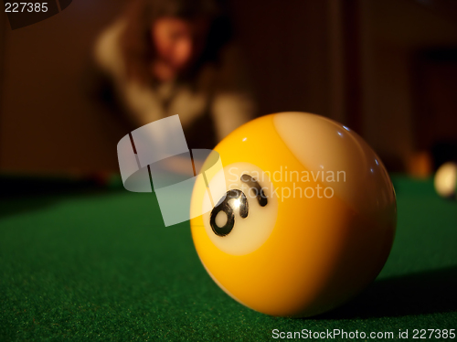 Image of Happy woman playing pool # 02
