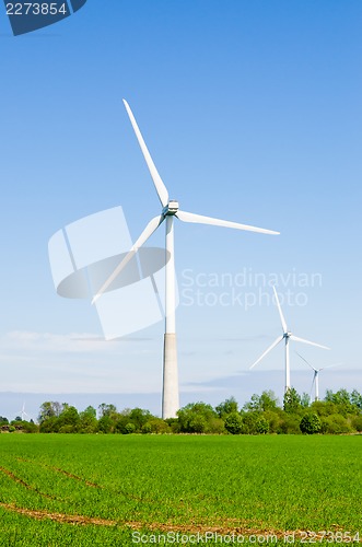 Image of Wind power installation in sunny day
