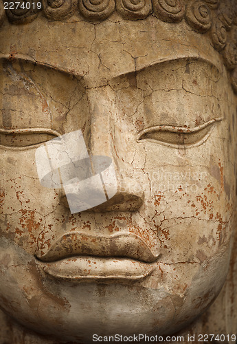 Image of Face of stone Buddha statue