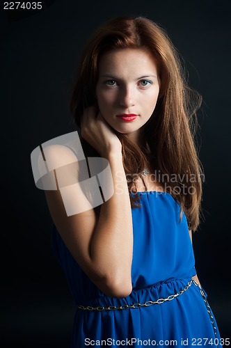 Image of beautiful young red haired woman